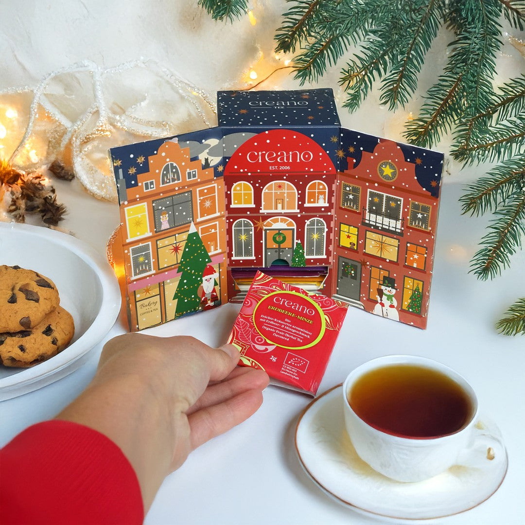 Creano Bio Tee Adventskalender "Weihnachtshaus" - 24 verschiedene BIO Tees - Kräutertee, Früchtetee, Grüner Tee, Weißer Tee, Schwarzer Tee, Chai *¹